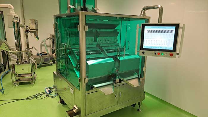 膠囊片劑檢重秤現(xiàn)場工作.jpg 膠囊片劑檢重秤現(xiàn)場工作.jpg